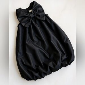 H&M black dress is bow size 7-8 years (Canadian) worn once!